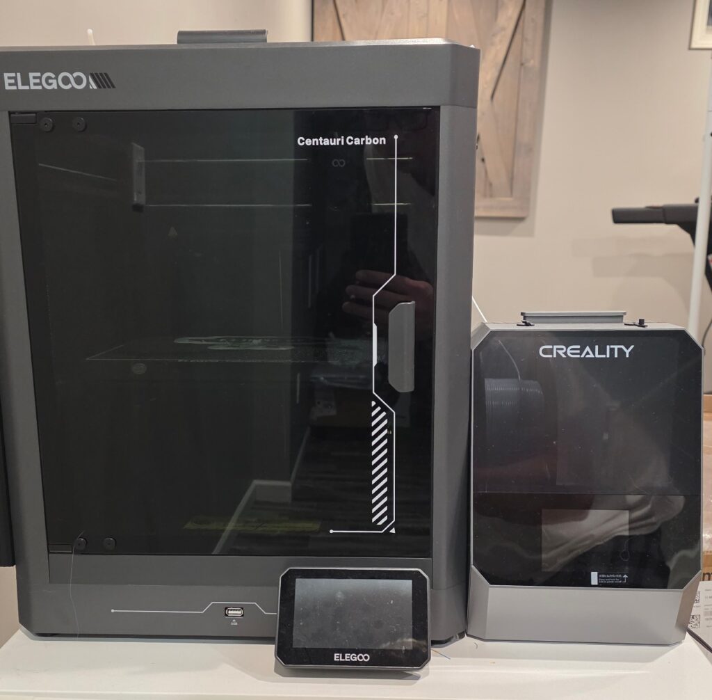Elegoo Centauri Carbon Sitting Next to my Creality Pi Dryer
