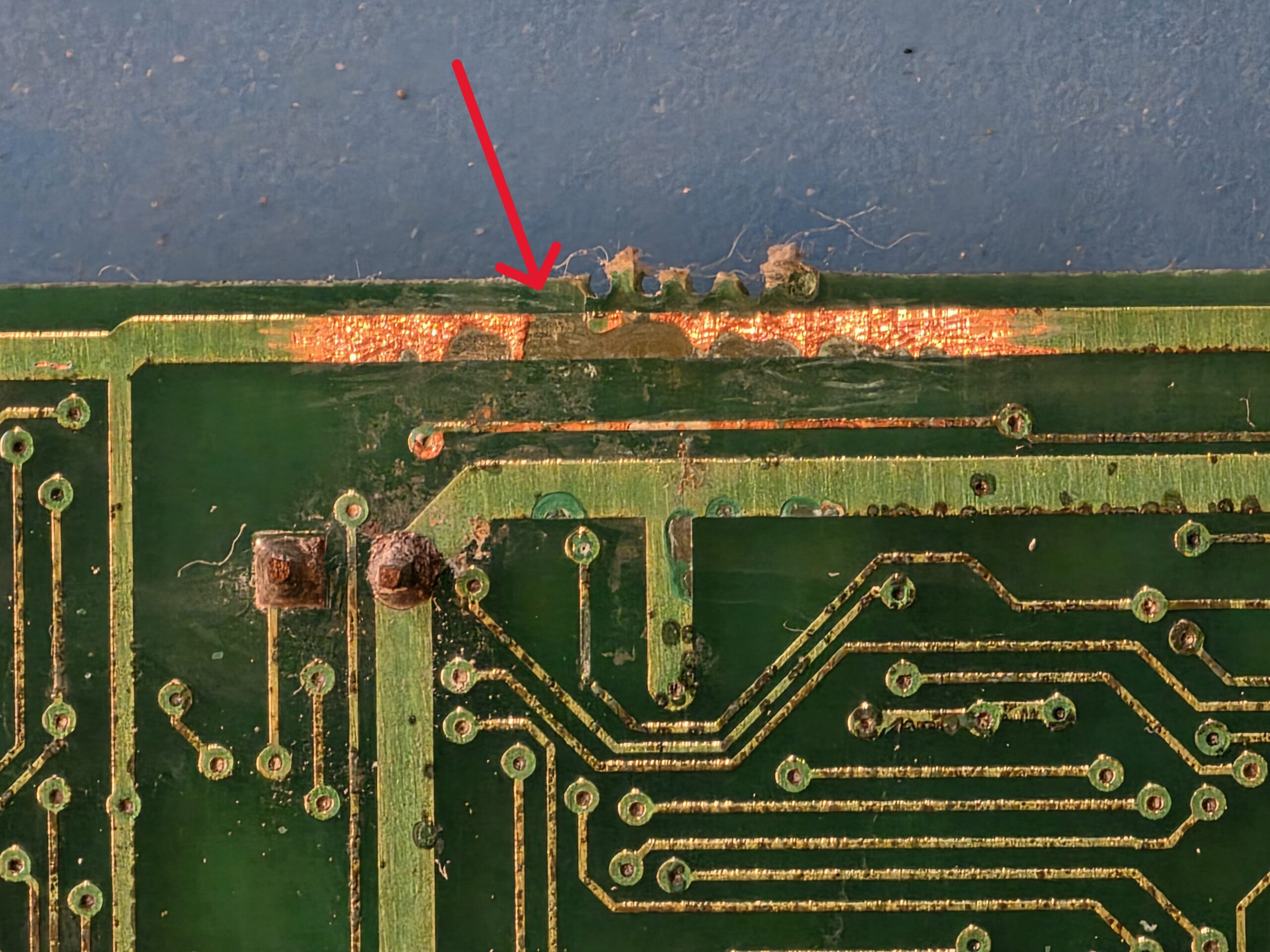 Damaged open PCB trace on traffic control board